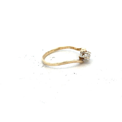 9ct yellow gold ring in size L with a smooth band, featuring a simple and elegant design.