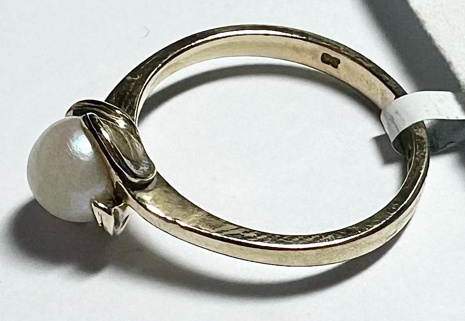 9ct yellow gold ring in size L1/2 with a smooth band, unbranded jewelry, shown on a plain background.