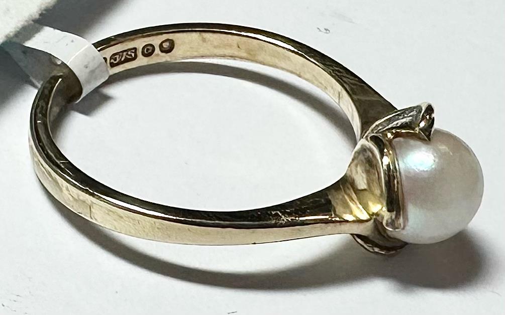 Yellow gold ring in size L1/2, 9 carats, unbranded, showcasing a smooth band design.