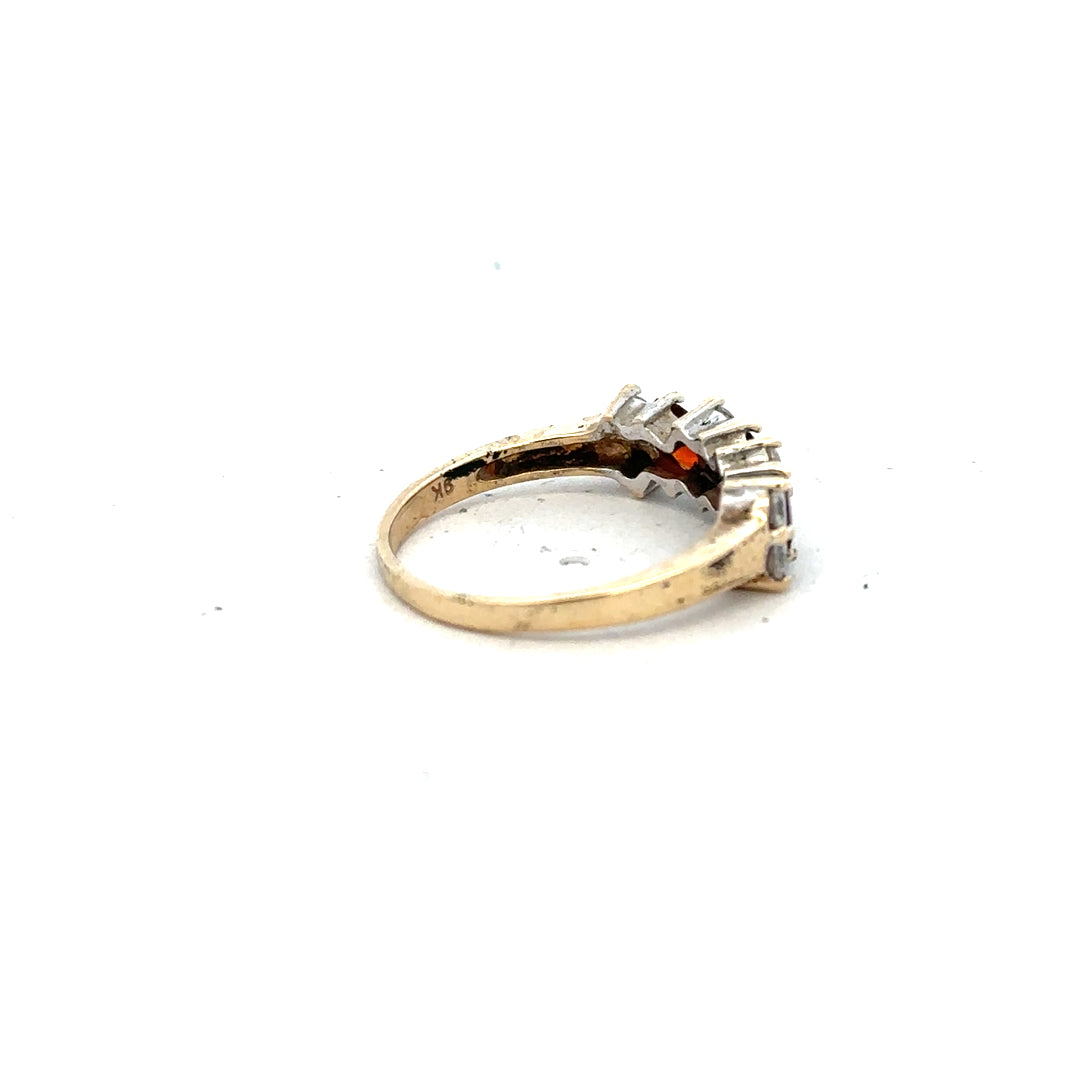 9ct yellow gold ring in size L1/2 with a simple band design, unbranded jewelry, shown in a close-up image.