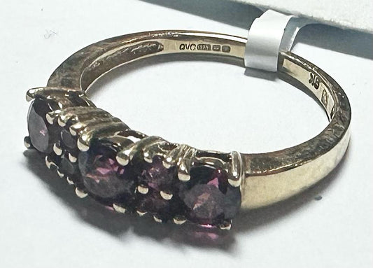 9ct yellow gold ring in size M with a smooth band, unbranded, shown on a plain background.