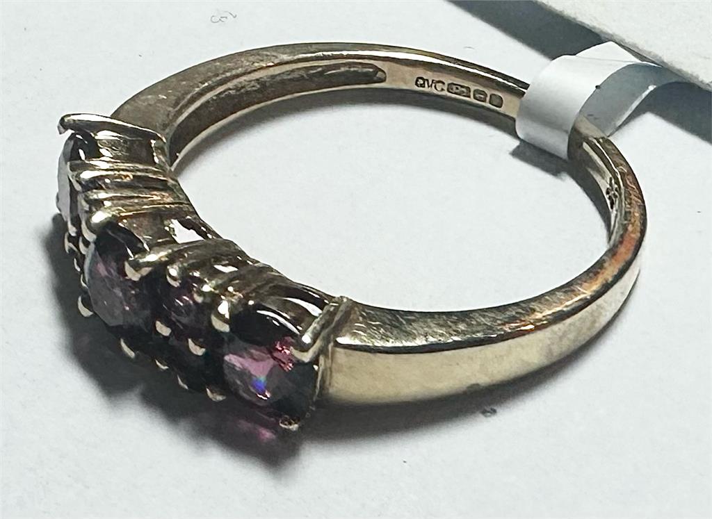9ct yellow gold ring size M with smooth band, unbranded jewelry piece displayed on a neutral background.