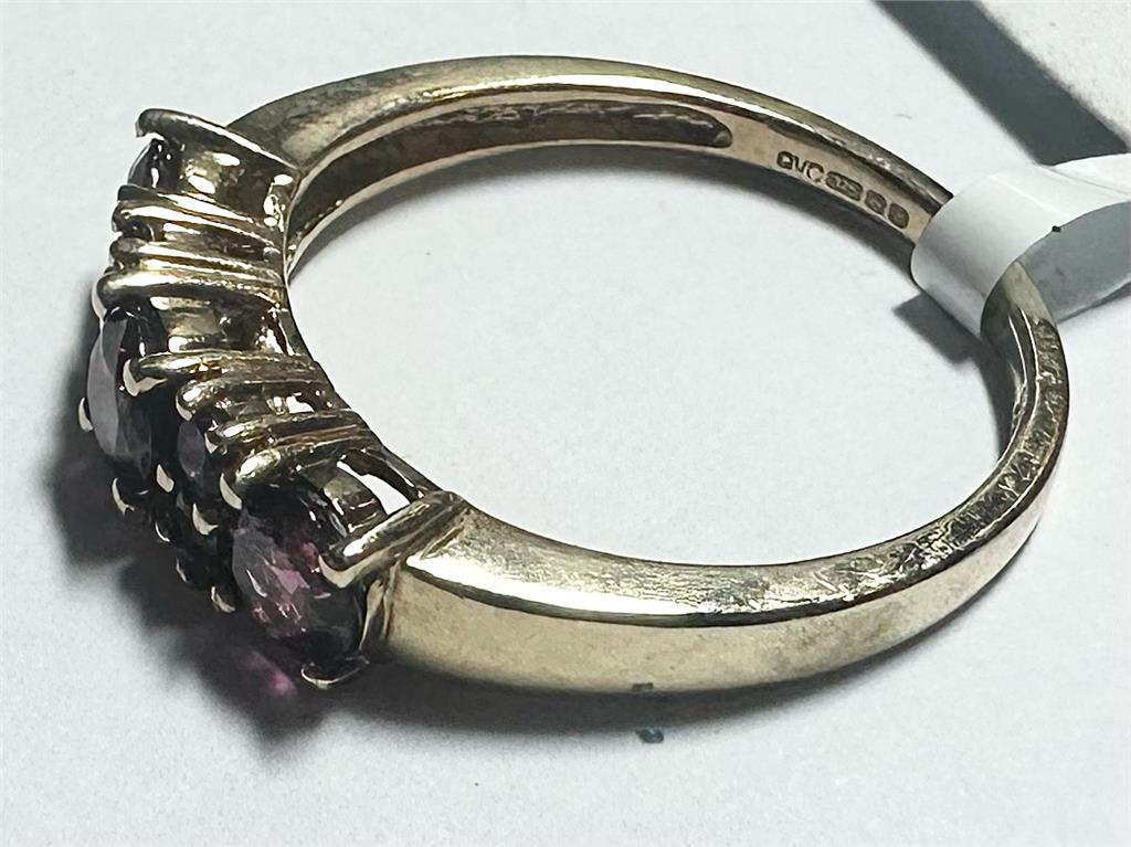 9ct yellow gold ring size M with a smooth polished band, unbranded jewelry showcasing elegant craftsmanship.
