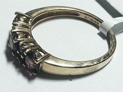 9ct yellow gold ring size M with a smooth polished band, unbranded jewelry showcasing elegant craftsmanship.