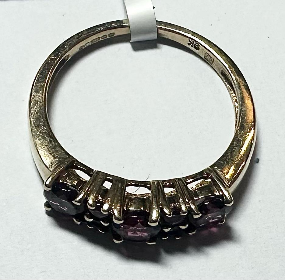 9ct yellow gold ring in size M, featuring a smooth polished band, unbranded jewelry crafted from yellow gold.