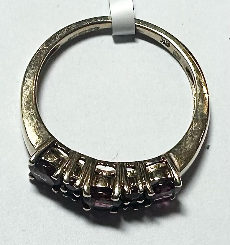 9ct yellow gold ring in size M with a smooth band, unbranded jewelry designed for elegant style.