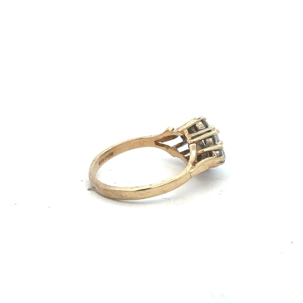 9ct yellow gold ring in size M with a smooth, polished band, showcasing elegant craftsmanship and a classic design.