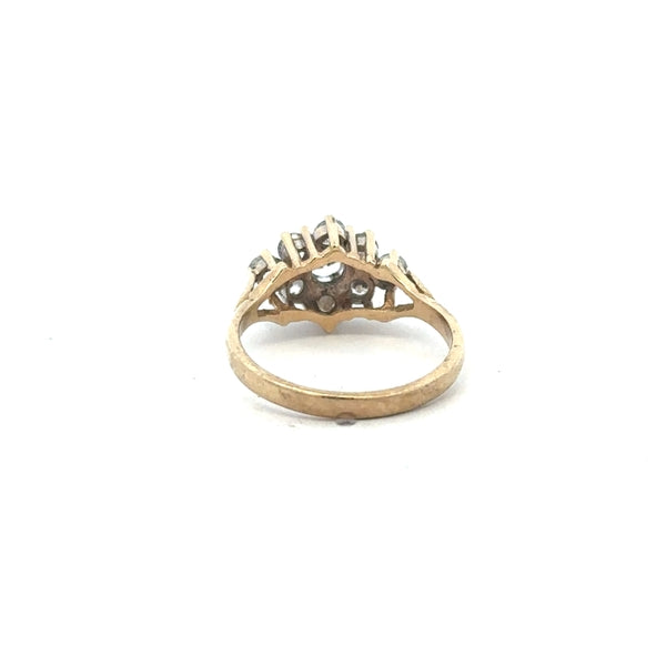 9ct yellow gold ring in size M with a smooth band, unbranded jewelry displayed against a neutral background.