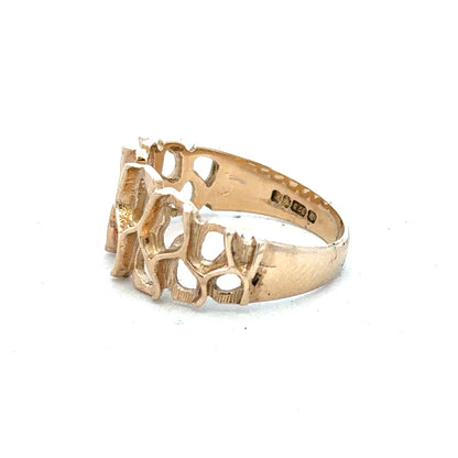 9ct yellow gold ring in size M with a smooth band, showcasing a polished finish and classic design.