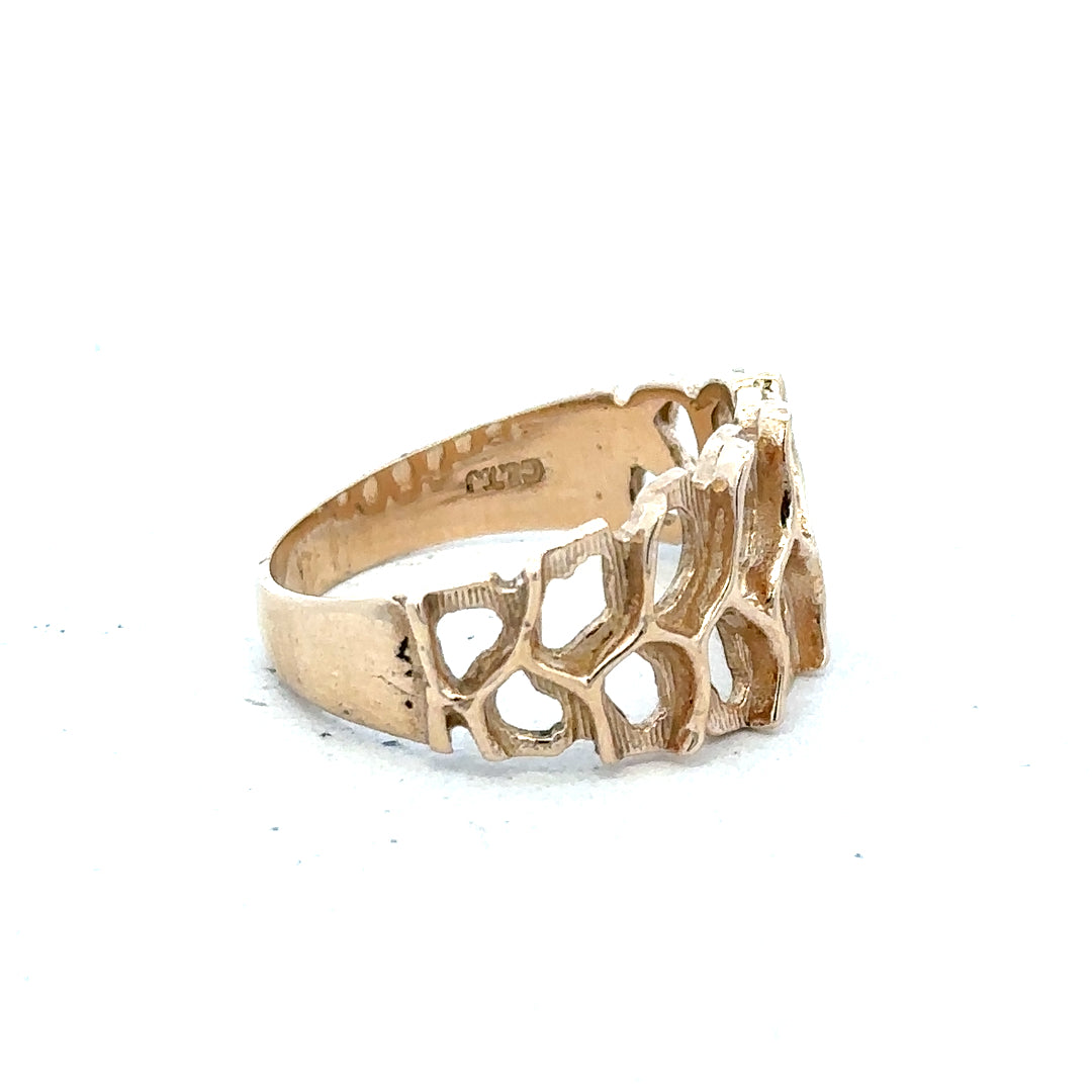 9ct yellow gold ring in size M with a simple, smooth band, unbranded jewelry piece displayed on a plain background.