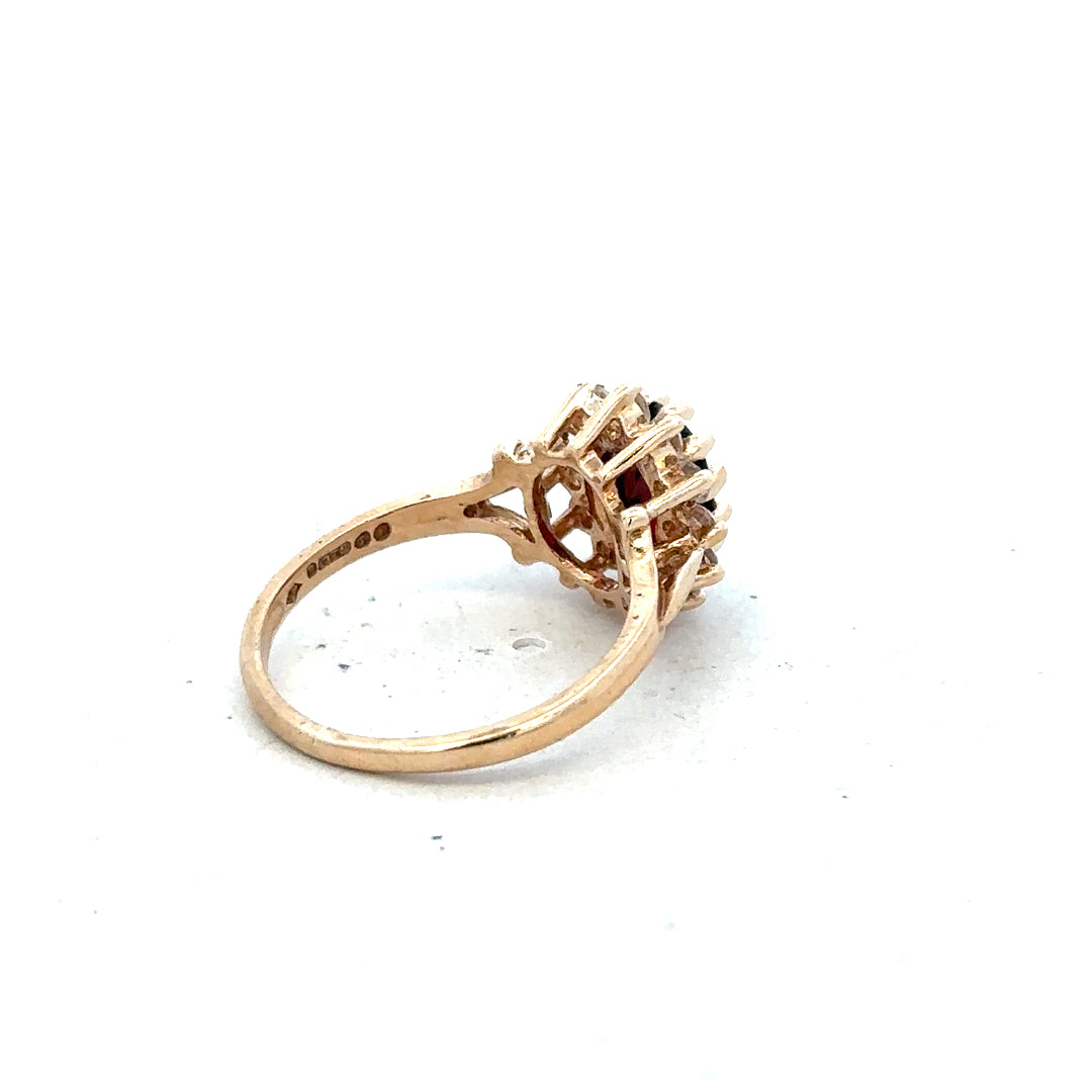9ct yellow gold ring in size M with a smooth band, unbranded jewelry piece displayed against a neutral background.