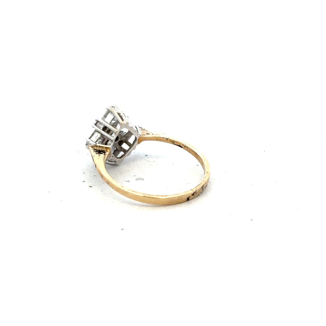 9ct yellow gold ring in size M with a smooth band, unbranded jewelry piece, shown against a neutral background.
