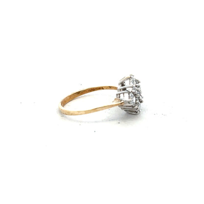 9ct yellow gold ring in size M with a smooth polished band, unbranded jewelry displayed on a neutral background.