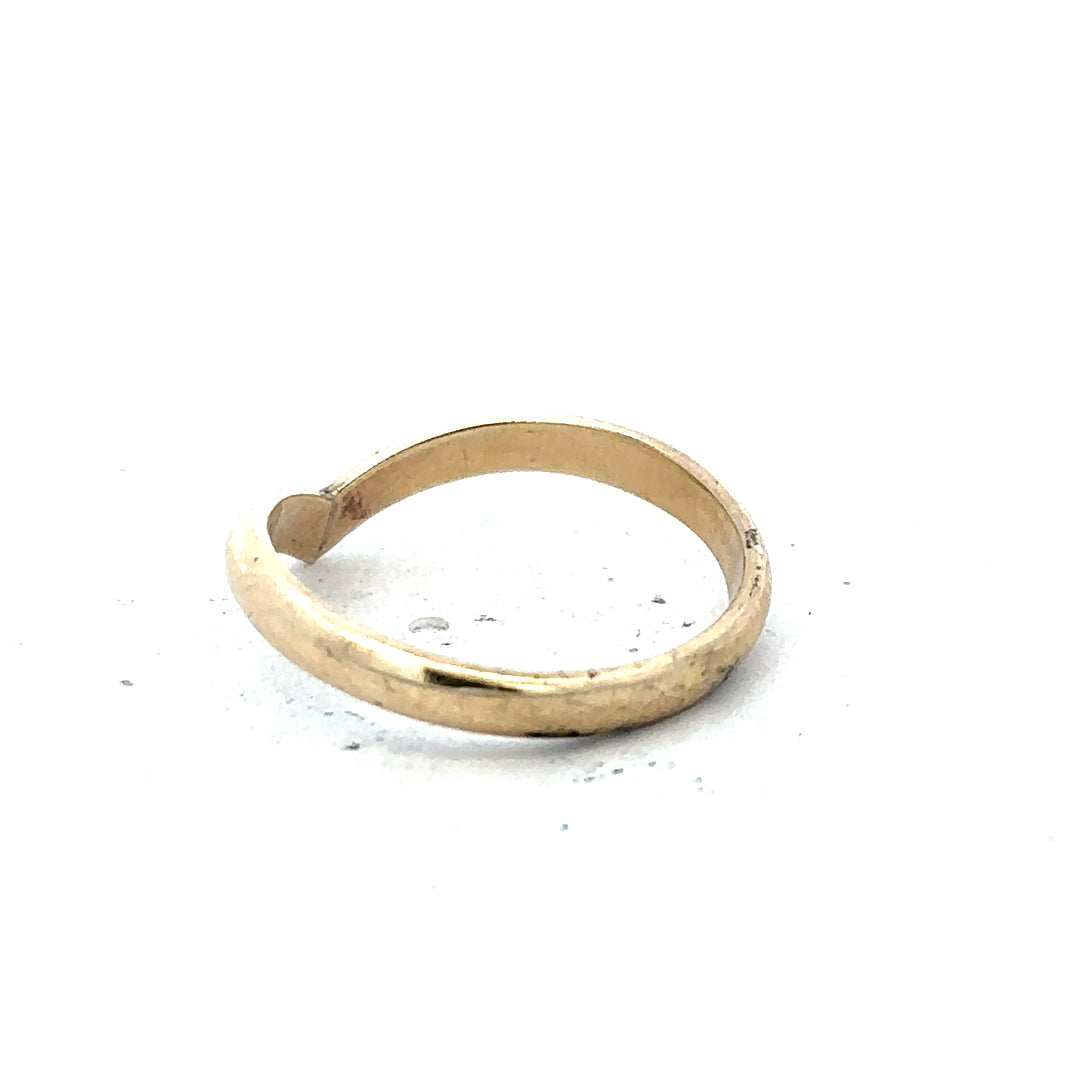9ct yellow gold ring in size M with a smooth band, unbranded jewelry piece showcasing a polished finish.