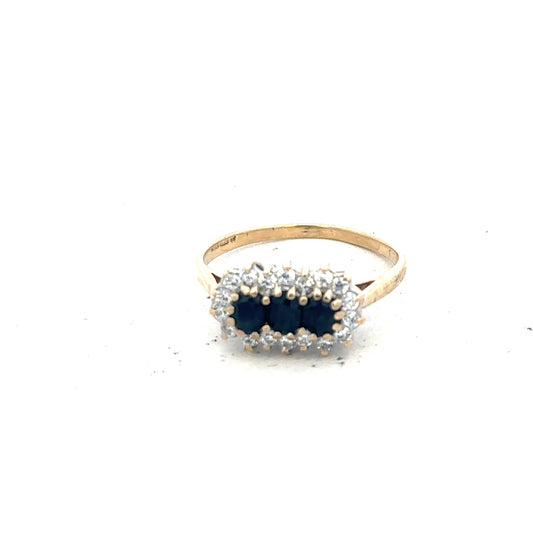 9ct yellow gold ring in size M, featuring a smooth polished band, unbranded jewelry shown against a neutral background.