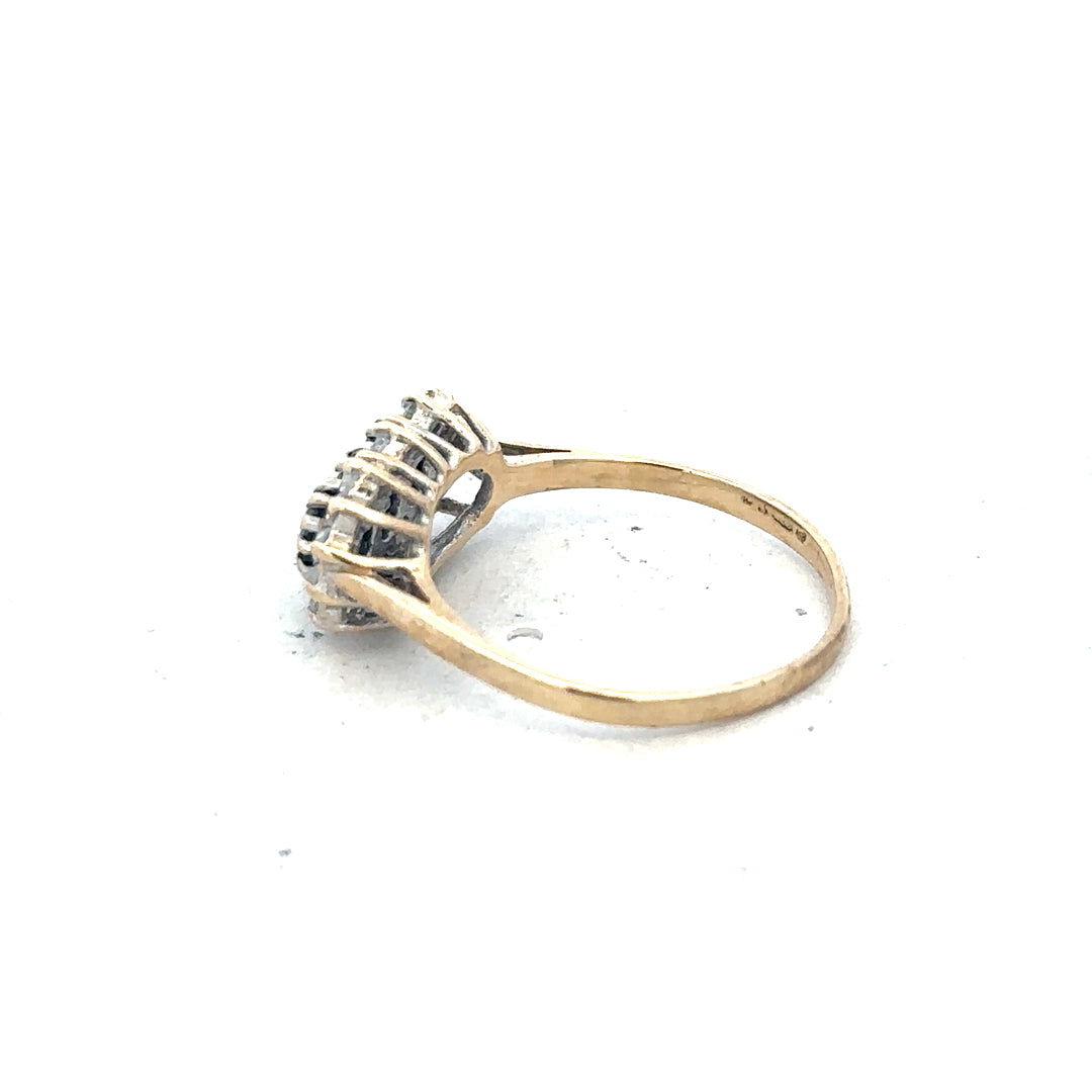 9ct yellow gold ring in size M with a smooth, polished band, unbranded jewelry displayed on a neutral background.