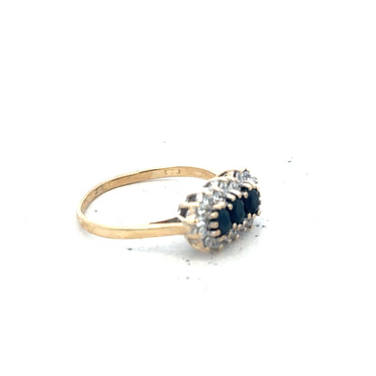 9ct yellow gold ring in size M with a smooth band, unbranded jewelry piece, shown from a side view.