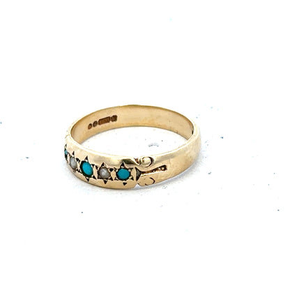 9ct yellow gold ring in size M, featuring a smooth polished band, unbranded jewelry, shown in close-up.