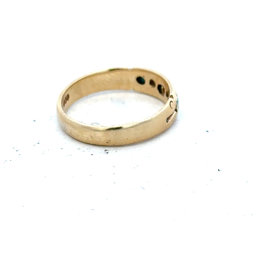 9ct yellow gold ring in size M with a simple band design, unbranded.