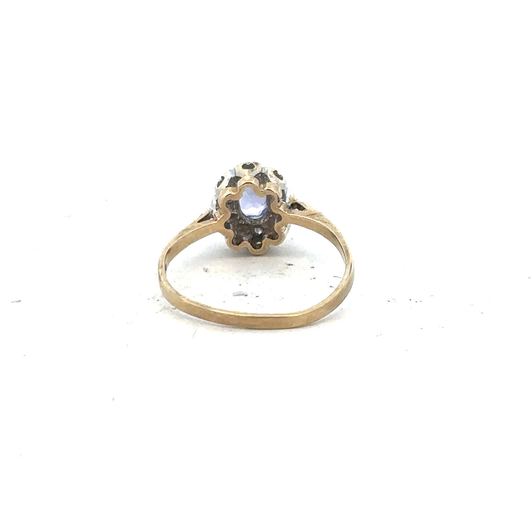 9ct yellow gold ring size M1/2 with smooth band, unbranded jewelry, shown in a close-up image.