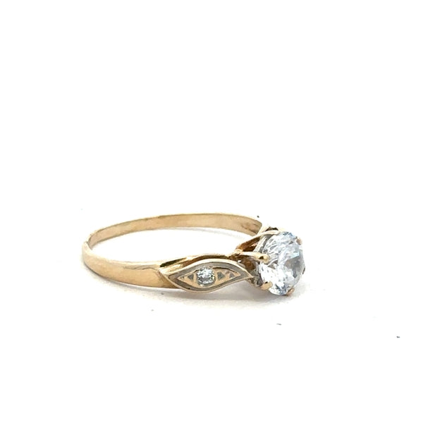 9ct yellow gold ring in size M1/2 with a smooth band, unbranded jewelry showing a close-up view of the ring.