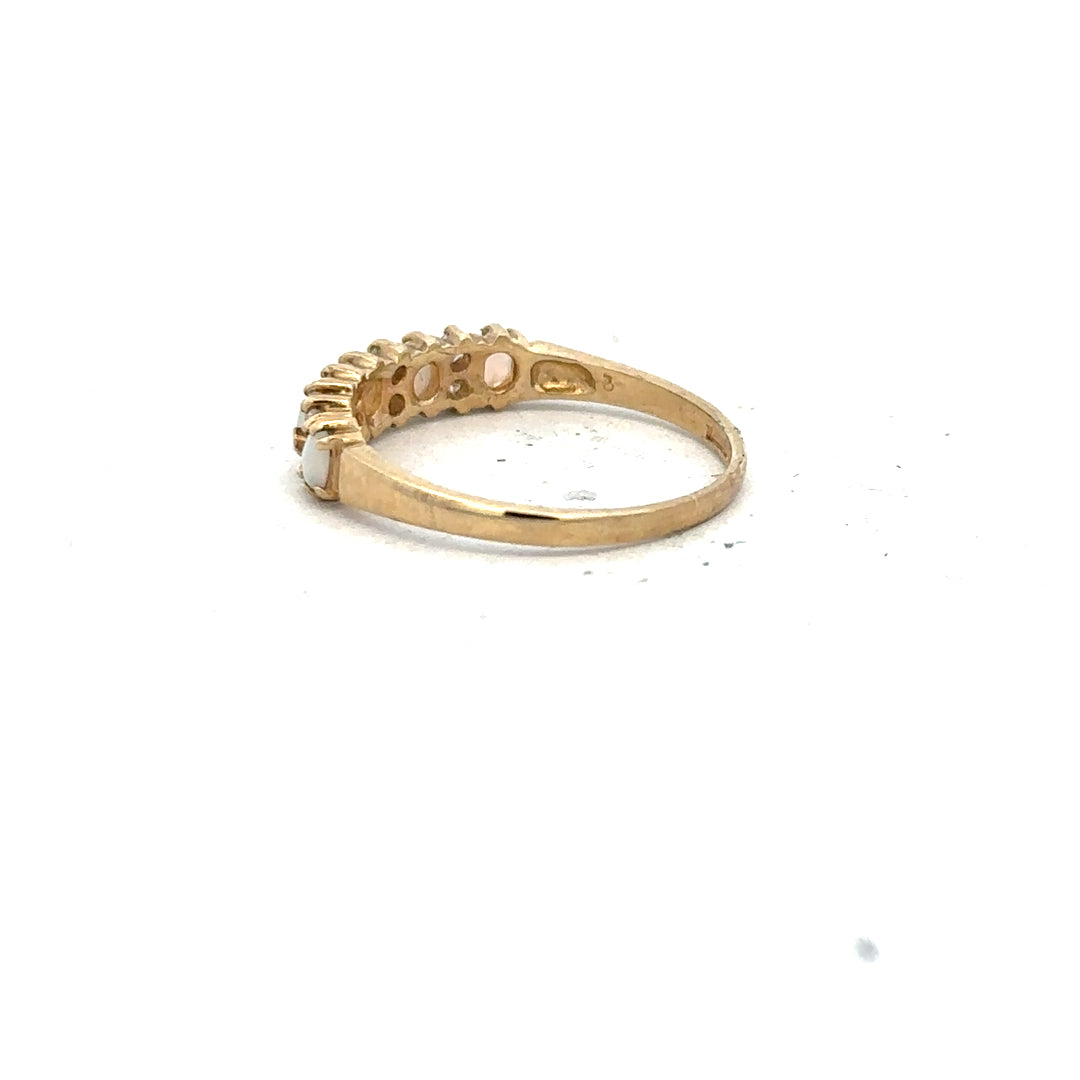 9ct yellow gold ring in size N with a smooth polished finish, unbranded jewelry displayed on a plain background.