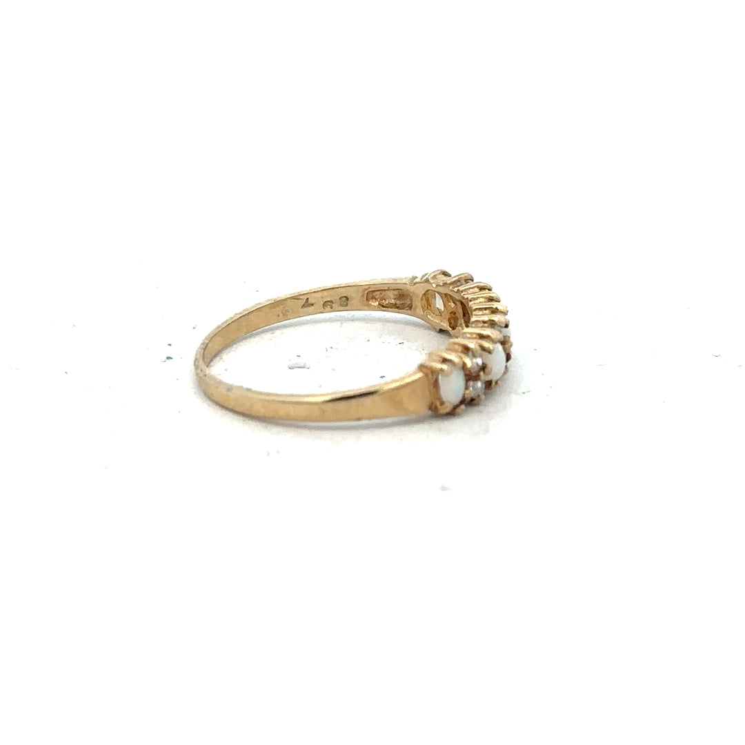9ct yellow gold ring size N with smooth band, unbranded jewelry piece displayed on a white background