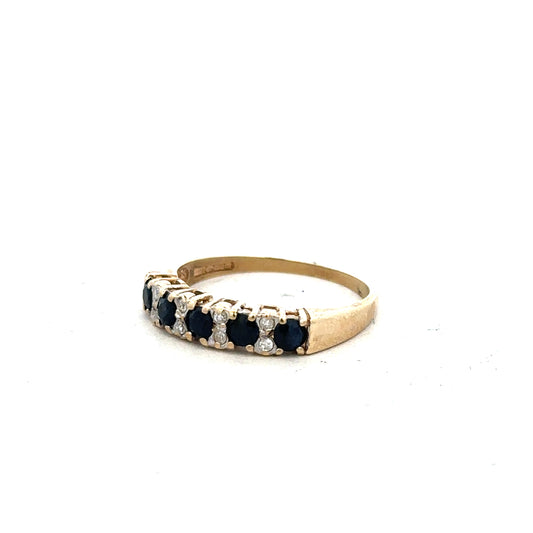 9ct yellow gold ring in size N, showcasing a smooth polished band on a plain background.