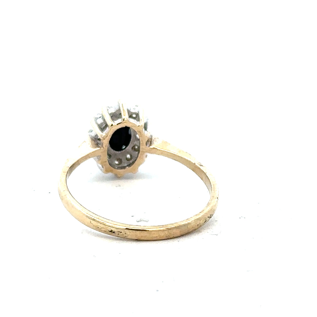 9ct yellow gold ring in size N with a smooth polished band, unbranded jewelry, shown in a close-up image.