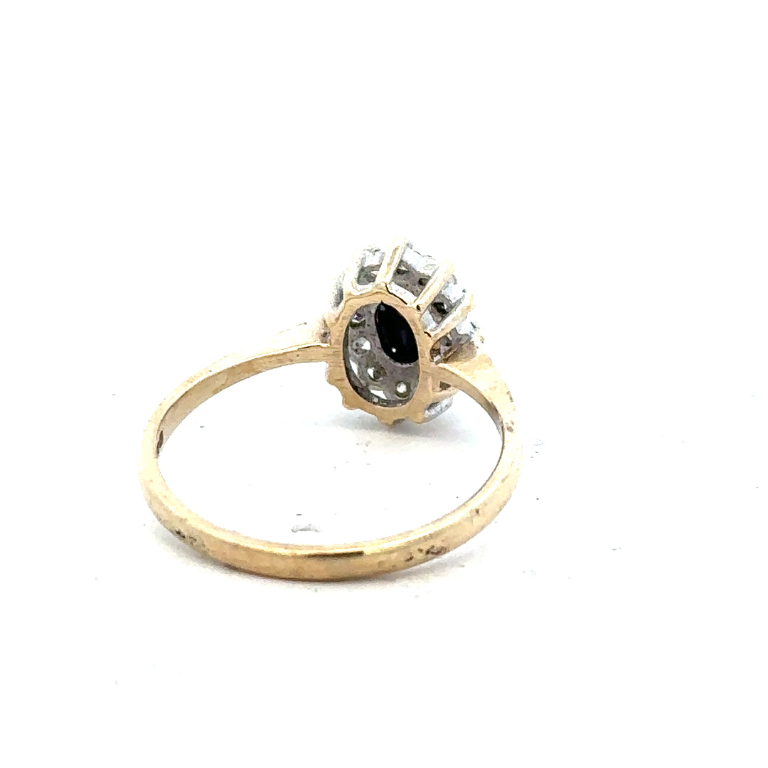 9ct yellow gold ring in size N with a smooth band, unbranded, shown from a side view.