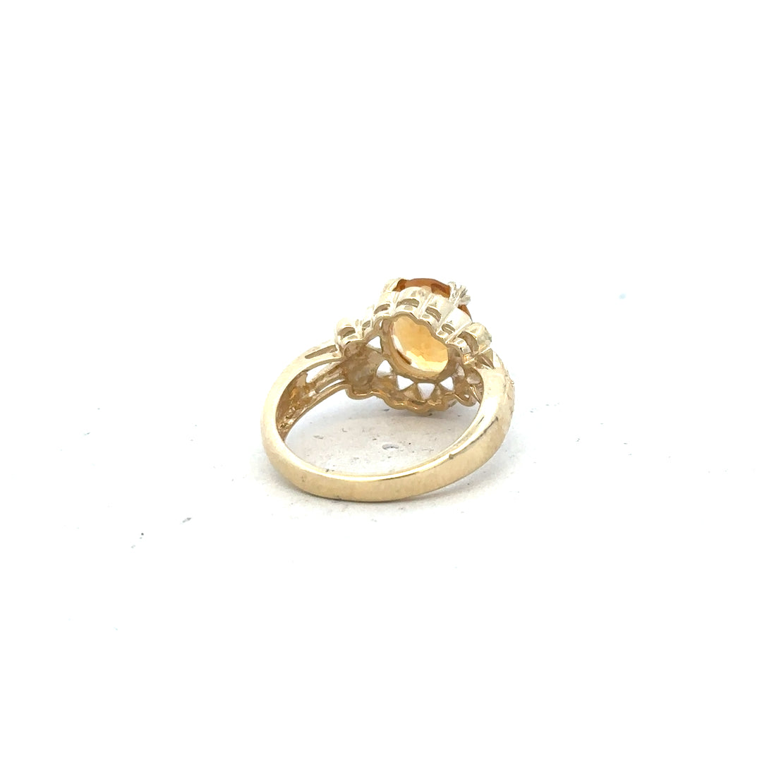 9ct yellow gold ring in size N, featuring a smooth band and classic design, displayed on a white background.