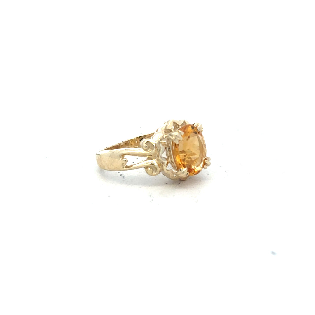 9ct yellow gold ring in size N with a simple band, unbranded jewelry piece displayed on a plain background.