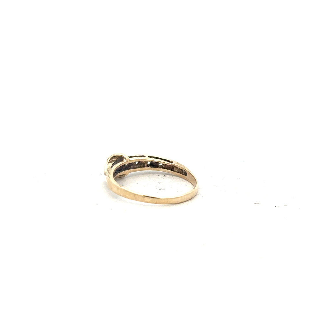 9ct yellow gold ring in size N with a simple band design, unbranded, featuring a polished finish and classic style.