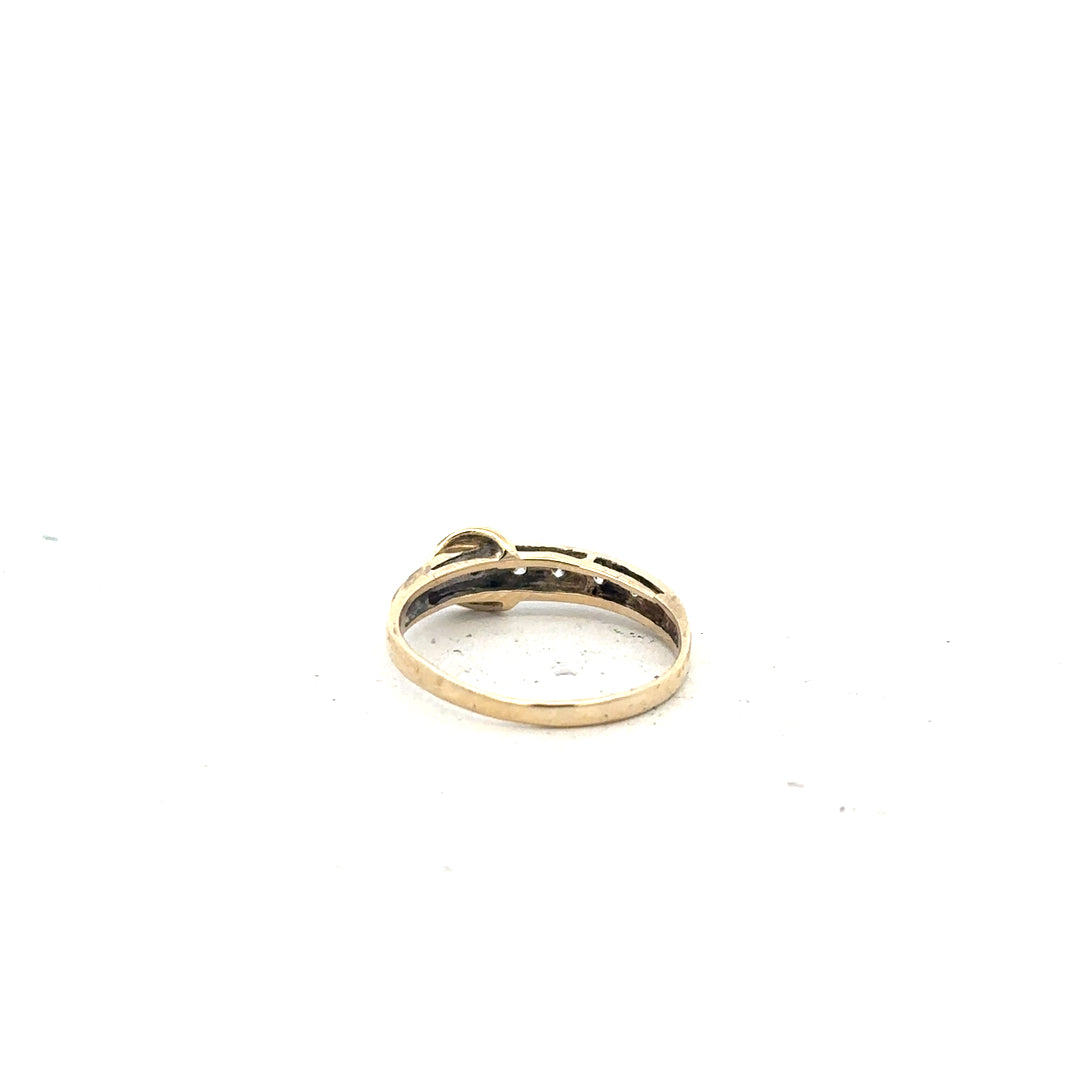 9ct yellow gold ring in size N with a smooth band, unbranded jewelry, shown in a close-up image.