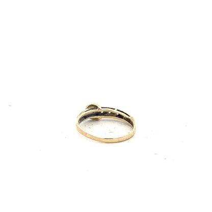 9ct yellow gold ring in size N with a smooth band, unbranded jewelry, shown in a close-up image.