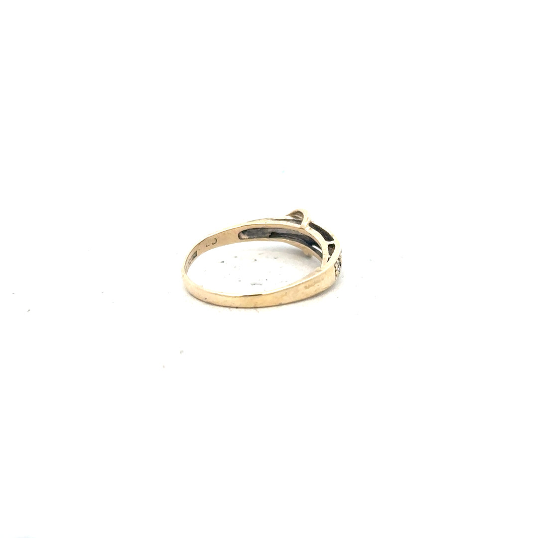 9ct yellow gold ring in size N with a smooth band, unbranded jewelry, showcasing a shiny polished finish.
