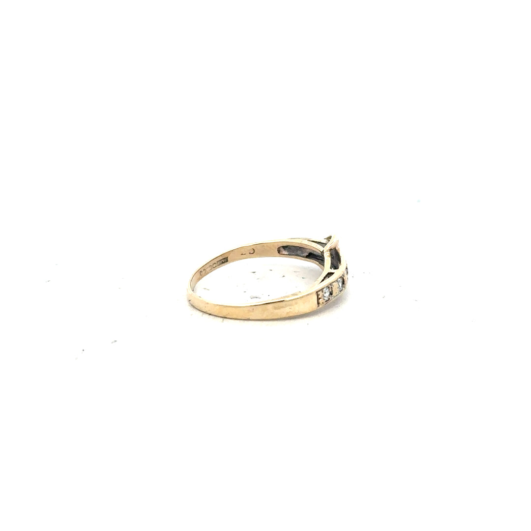 9ct yellow gold ring in size N with a smooth band, unbranded, showcasing a simple and elegant jewelry design.