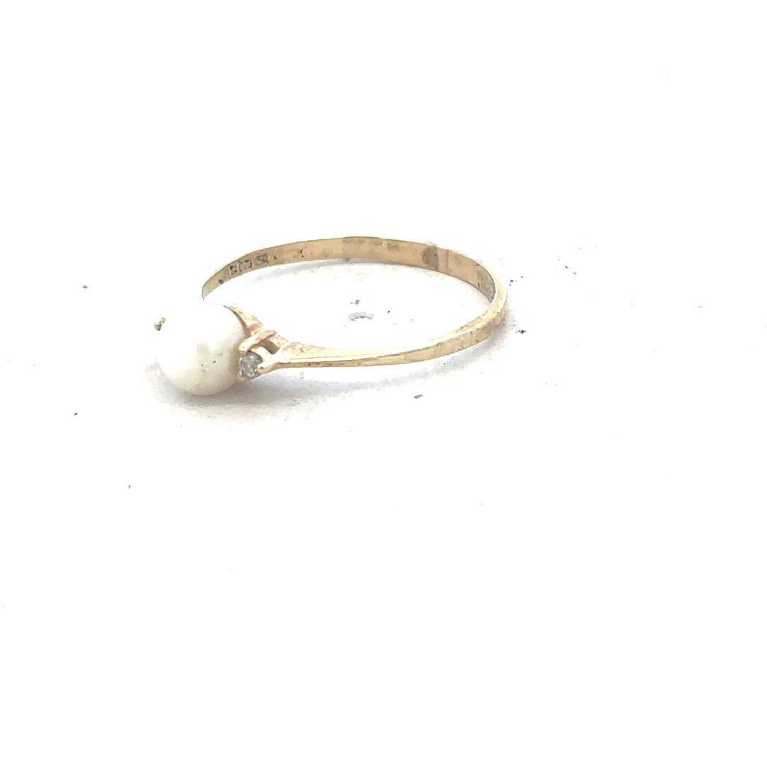 9ct yellow gold ring in size N with a smooth band, unbranded jewelry showcasing classic gold craftsmanship.