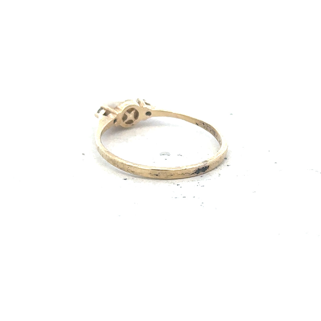9ct yellow gold ring in size N with a smooth band, unbranded, showcased on a neutral background.