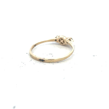 9ct yellow gold ring in size N with a simple band, unbranded jewelry piece displayed on a plain background.