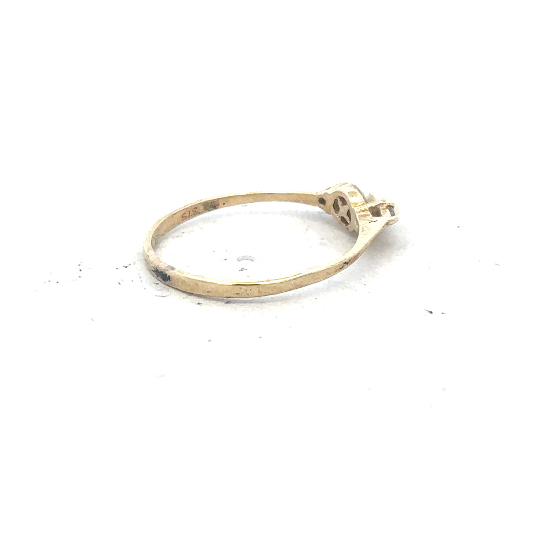 9ct yellow gold ring size N with a smooth band, unbranded jewelry piece shown in close-up image.