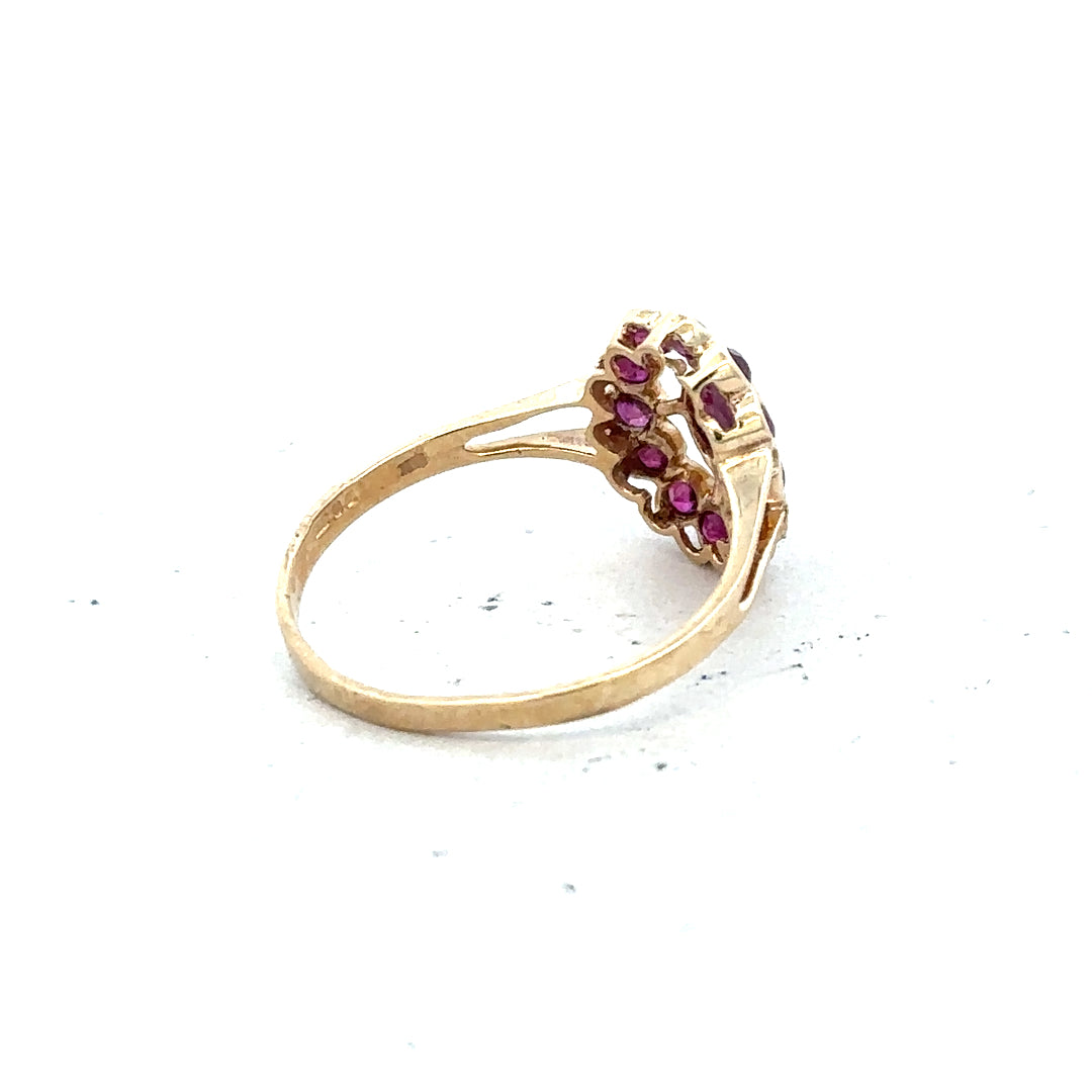 9ct yellow gold ring in size N, featuring a smooth polished band, unbranded jewelry, photographed on a plain background.