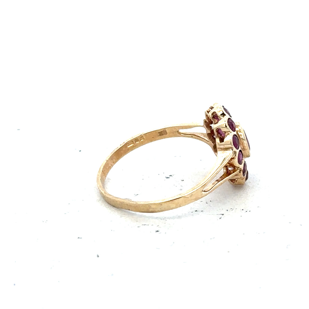 9ct yellow gold ring in size N with a smooth polished band, unbranded jewelry showcasing classic elegance.