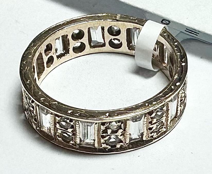 9ct yellow gold ring in size N1/2, unbranded, showing a smooth polished band with a simple elegant design.