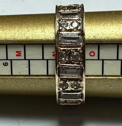 9ct yellow gold ring in size N1/2, featuring a smooth polished band and classic design, unbranded.