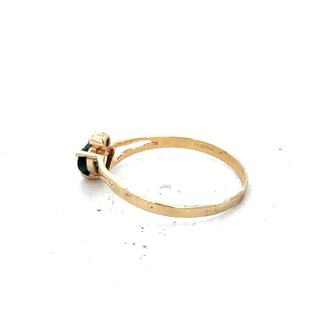 9ct yellow gold ring size N1/2 with a smooth band, displayed on a plain background, showcasing its simple, elegant design.