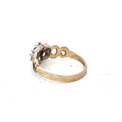9ct yellow gold ring in size O with a smooth band, unbranded jewelry piece displayed on a white background.