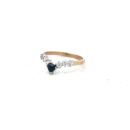 9ct yellow gold ring in size O with a smooth band, unbranded, shown from a side angle on a plain background.