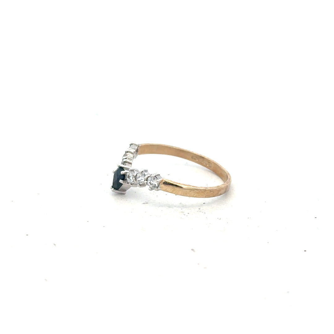 9ct yellow gold ring in size O with a smooth band, unbranded jewelry displayed on a neutral background.