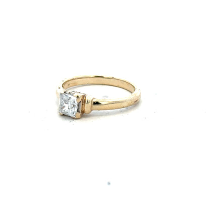 9ct yellow gold ring in size O with a smooth band, photographed on a plain background.